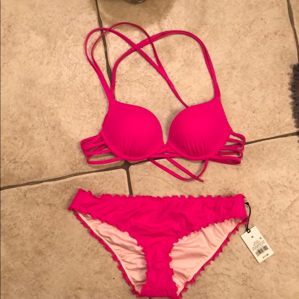 Never worn swim suit. Very cute target brand.